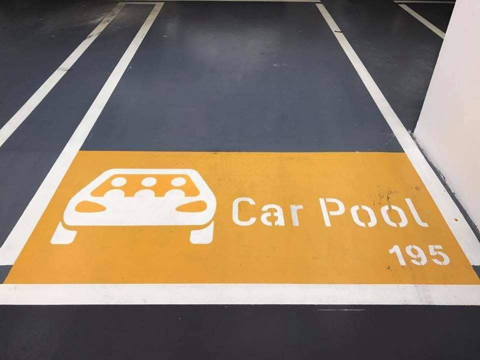 Car-pool bay stencil marking: epoxy deck marking, grey/amber